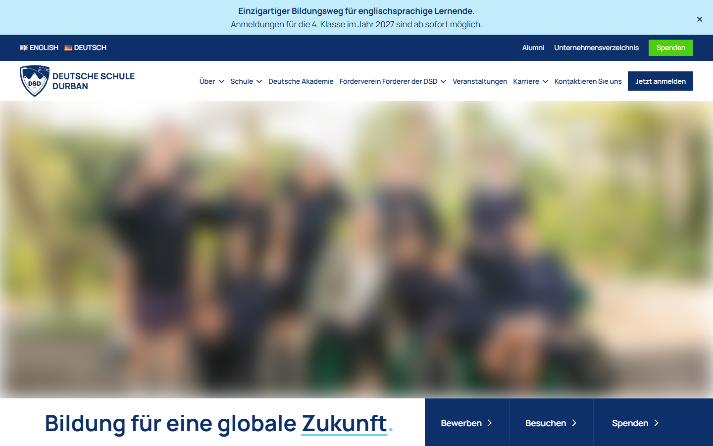 The Deutsche Schule Durban home page in German, with the photos blurred